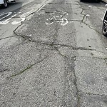 Pothole & Street Issues at Intersection Of Yosemite Ave & Keith St