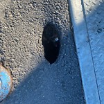 Pothole & Street Issues at Intersection Of 3rd Ti St & Avenue D