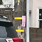 Illegal Postings at 725 6th Ave