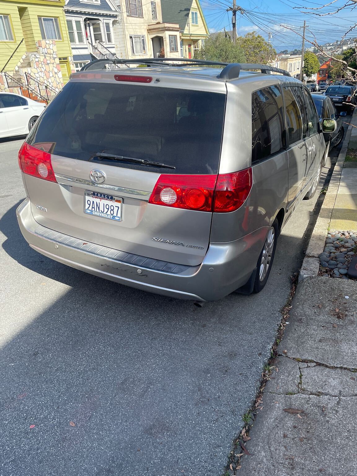 Photo of car in the street with license plate 9ANJ987 in California