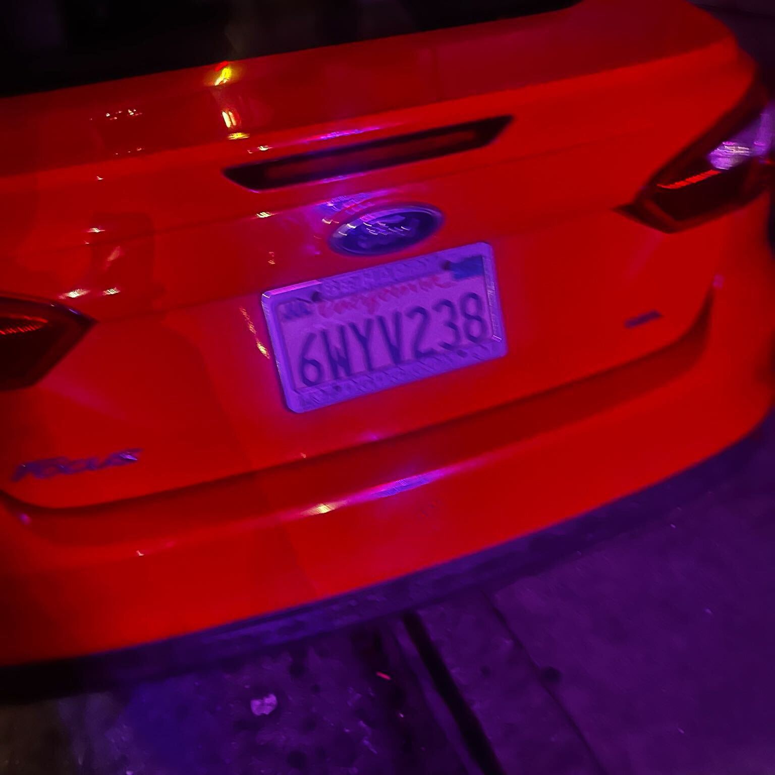Photo of car in the street with license plate 7WYV238 in California