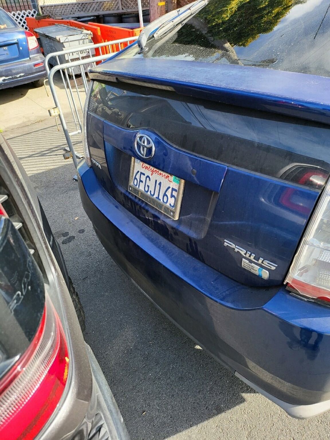 Photo of car in the street with license plate 6FGJ165 in California