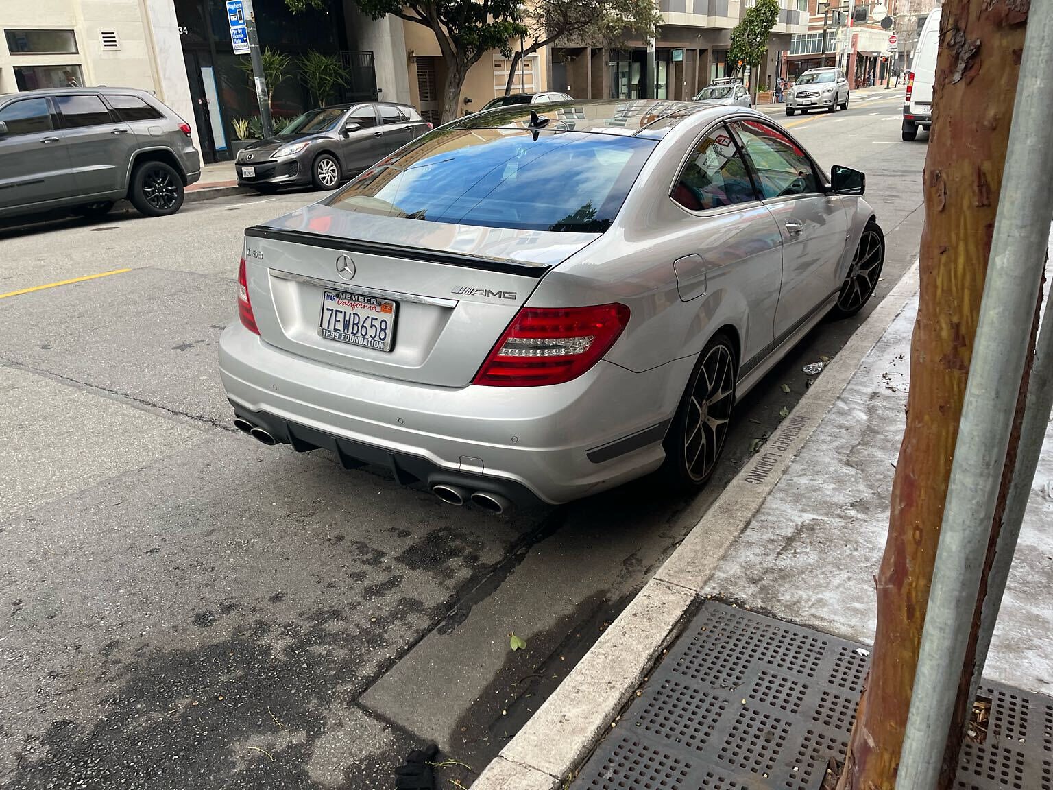 Photo of car in the street with license plate 7EWB658 in California