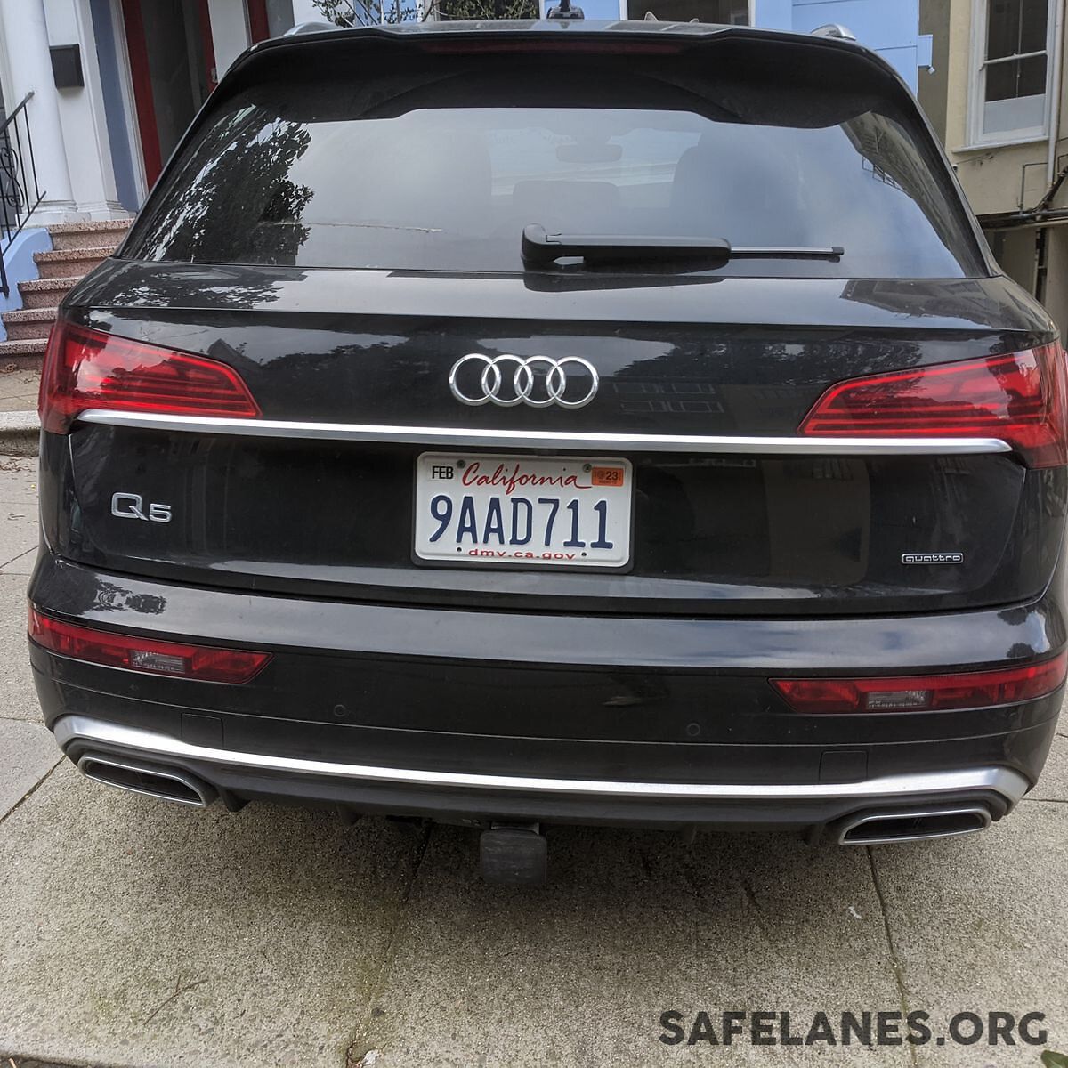 Photo of car in the street with license plate 9AAD711 in California