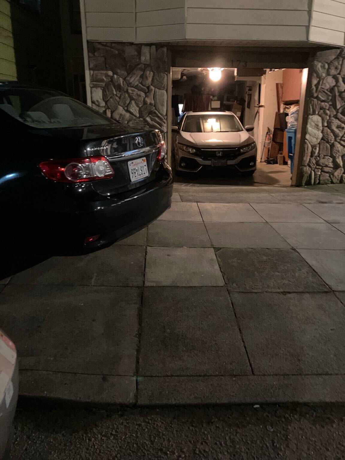 Photo of car in the street with license plate 9BXL817 in California