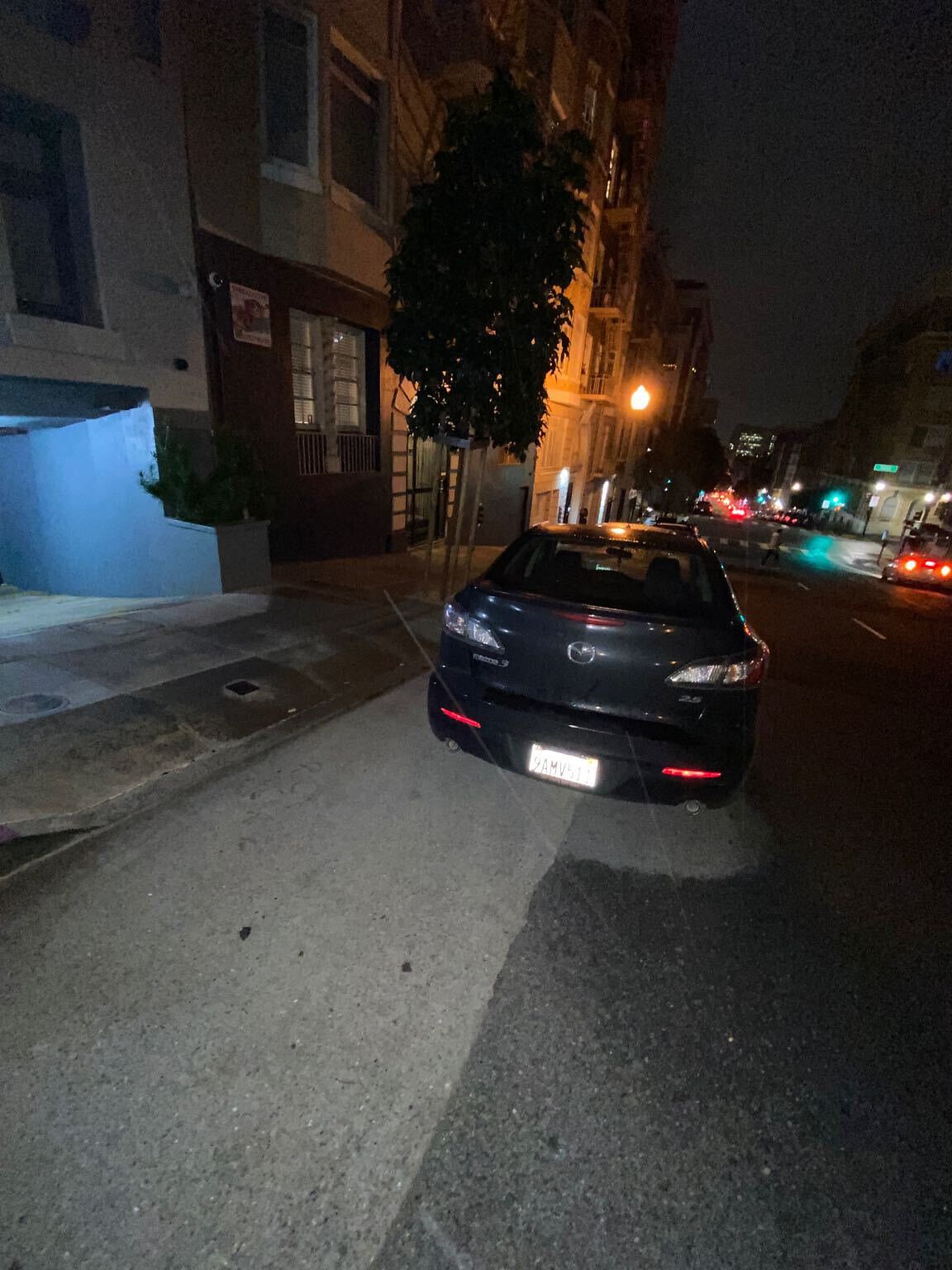 Photo of car in the street with license plate 9AMV511 in California