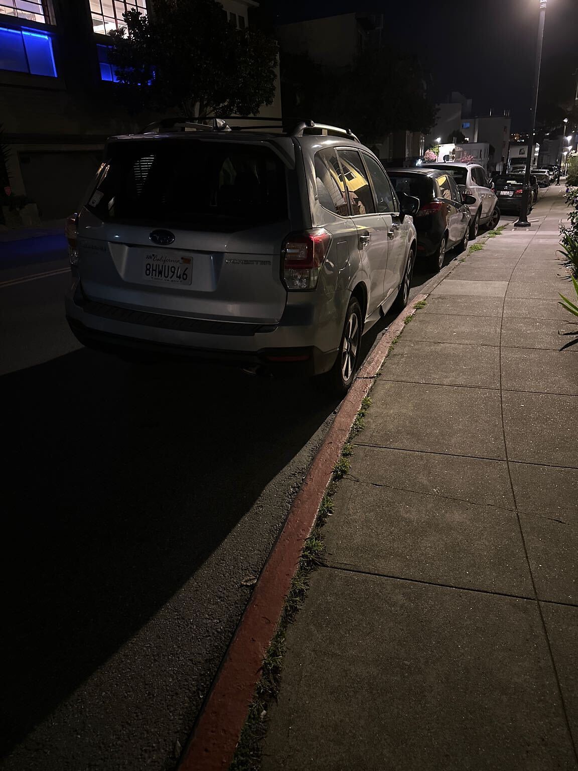 Photo of car in the street with license plate 8HWU946 in California