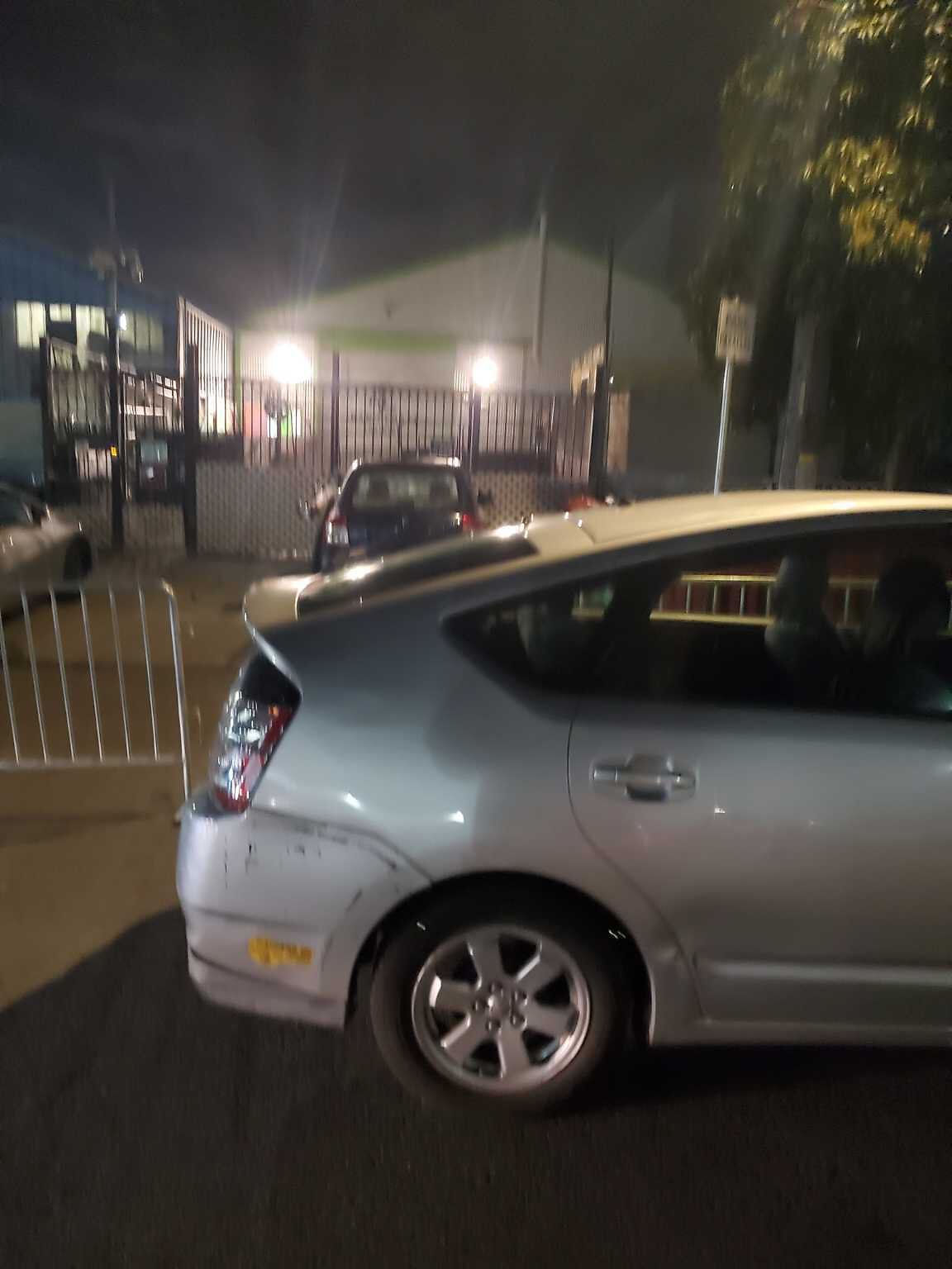Photo of car in the street with license plate 8XWT402 in California