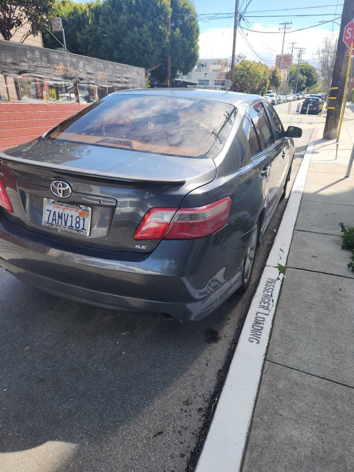 Photo of car in the street with license plate 7AMV181 in California
