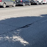 Pothole & Street Issues at Intersection Of Oak St & Shrader St