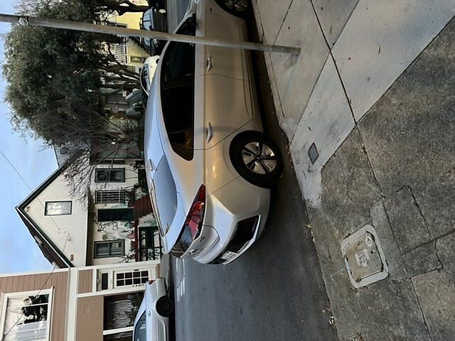 Photo of car in the street with license plate 8DJA307 in California