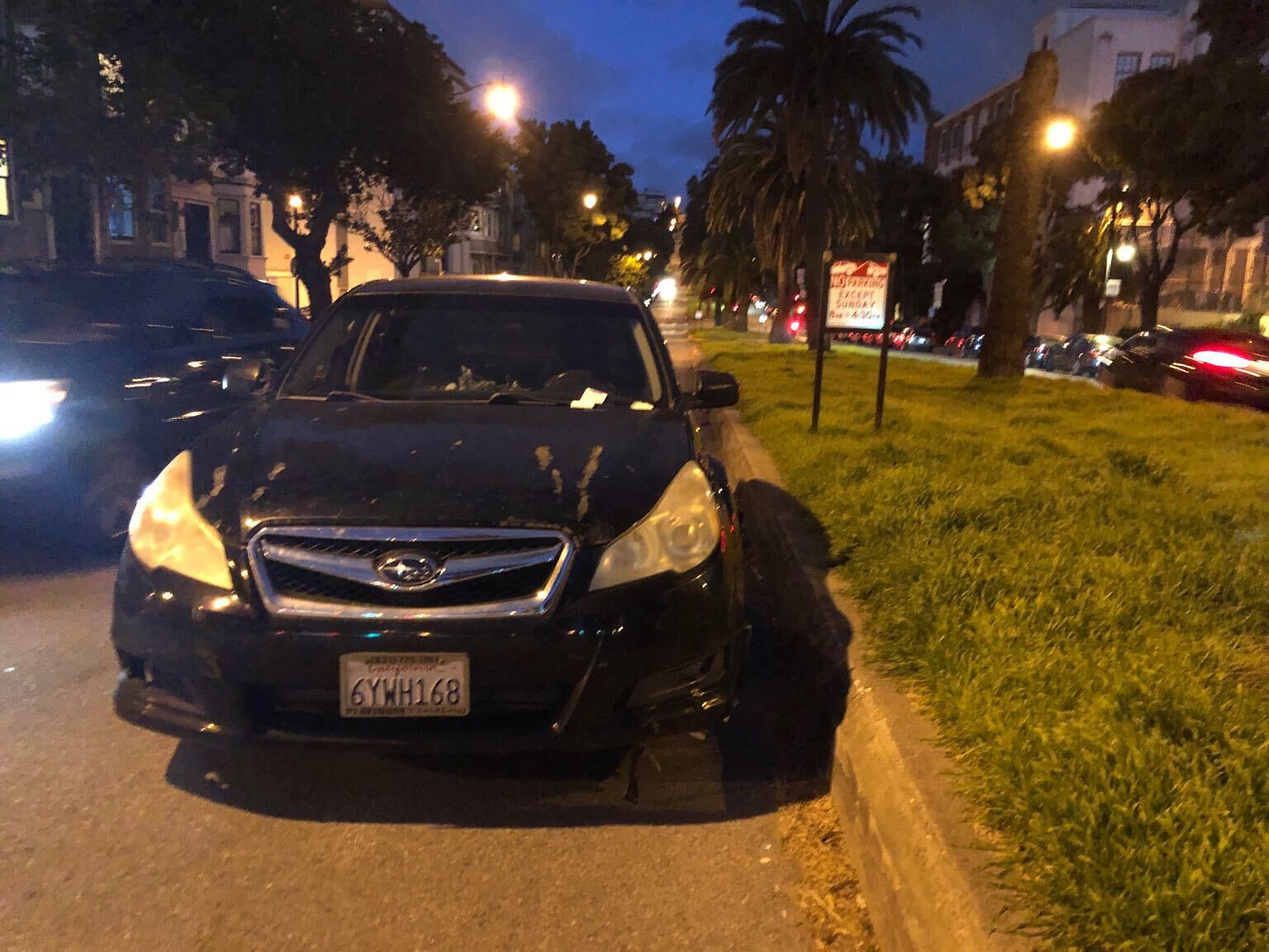 Photo of car in the street with license plate 6YWH168 in California
