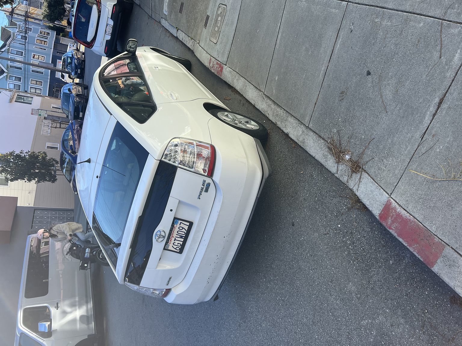 Photo of car in the street with license plate 6GRW097 in California