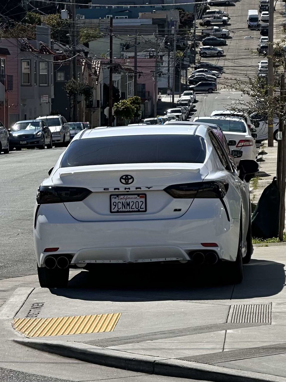 Photo of car in the street with license plate 9CNM202 in California