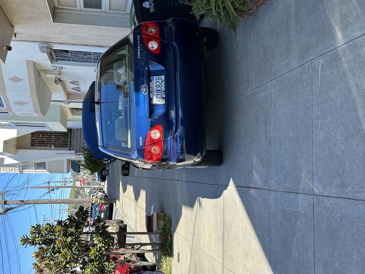 Photo of car in the street with license plate 6CUK828 in California