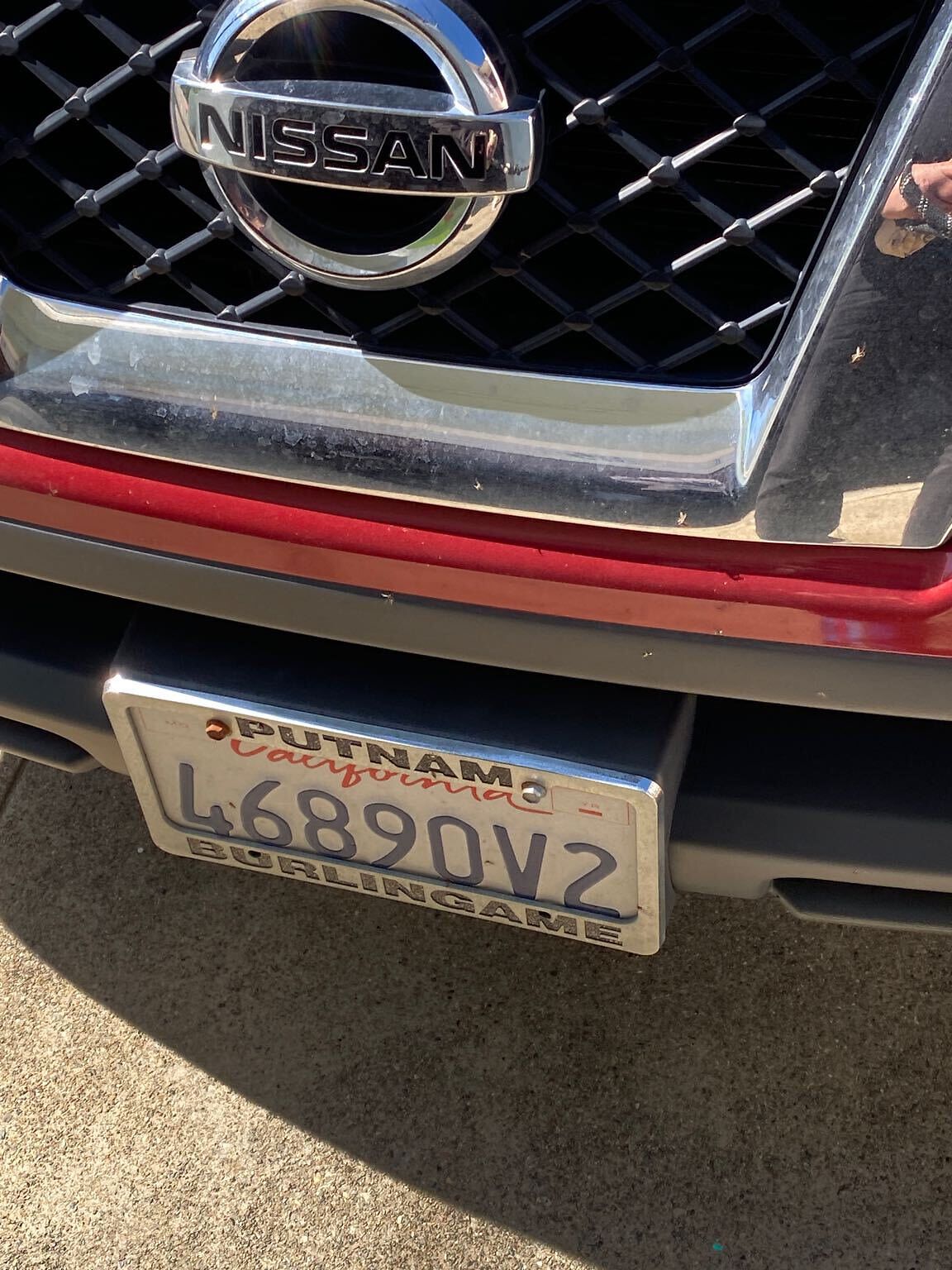 Photo of car in the street with license plate 46890V2 in California