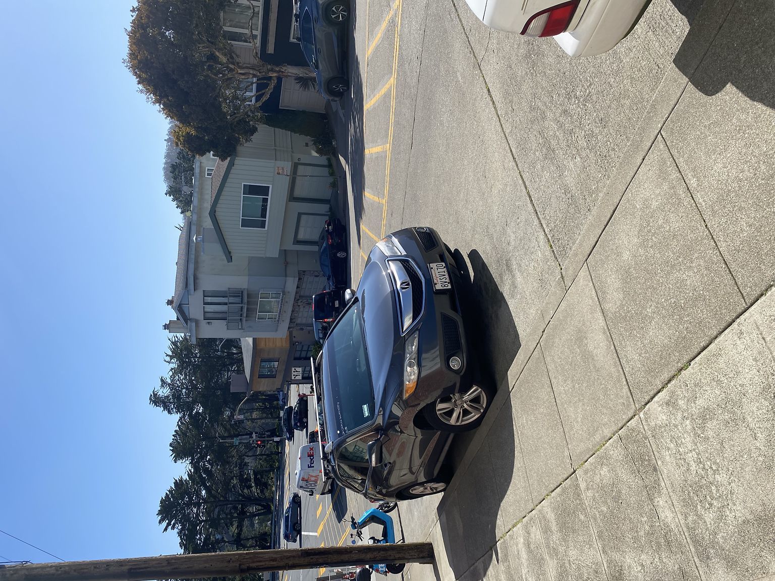 Photo of car in the street with license plate 8VSV170 in California