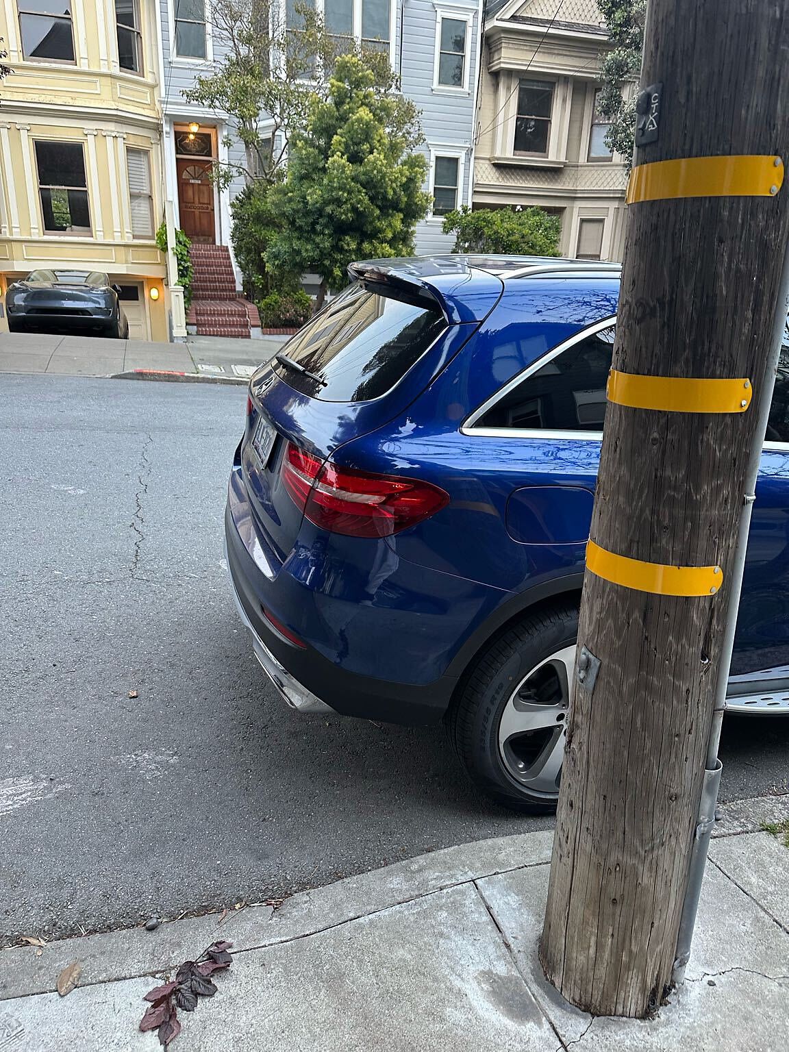 Photo of car in the street with license plate HLV3120 in California
