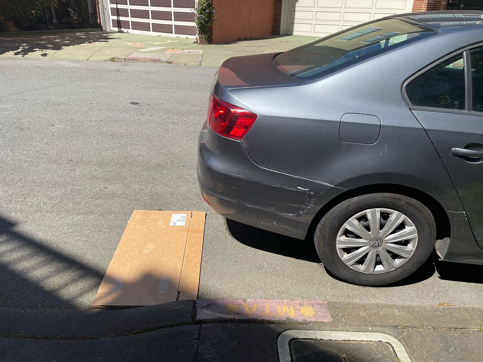 Photo of car in the street with license plate 7TCL838 in California
